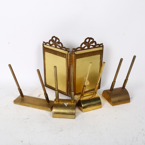 703 - 4 brass pen stands, and a gilt-brass hinged double photograph frame with ribbon pediments, height 20... 