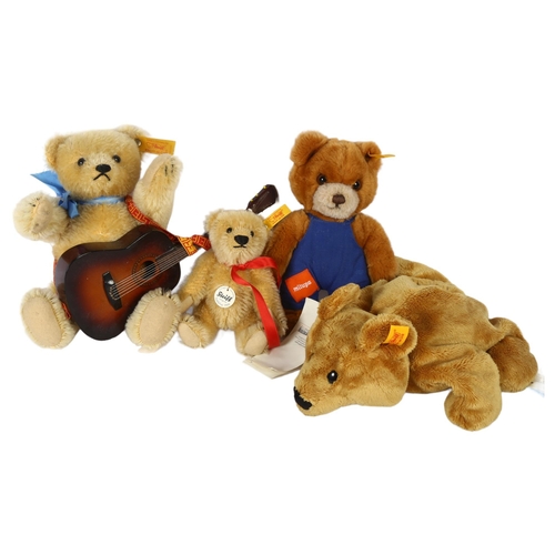 722 - A group of 4 Steiff teddy bears, including 1 with guitar, height 19cm