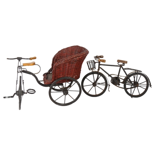 727 - Miniature rickshaw with basketwork seat, and a miniature iron bicycle, length 44cm