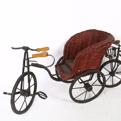 727 - Miniature rickshaw with basketwork seat, and a miniature iron bicycle, length 44cm