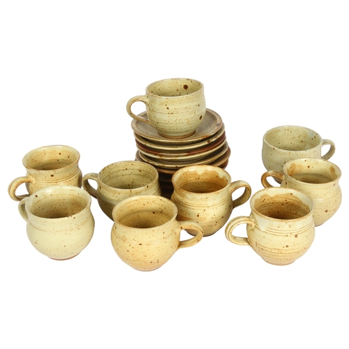 745 - Ray Finch for Winchcombe Pottery, a set of 9 stoneware cups and saucers, pottery and makers mark to ... 