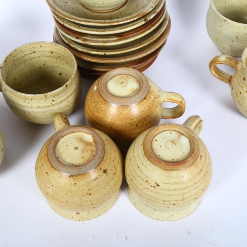 745 - Ray Finch for Winchcombe Pottery, a set of 9 stoneware cups and saucers, pottery and makers mark to ... 