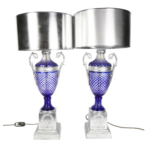 753 - A pair of table lamps with silvered plinths and shades, and blue overlay cut-glass columns, height 7... 