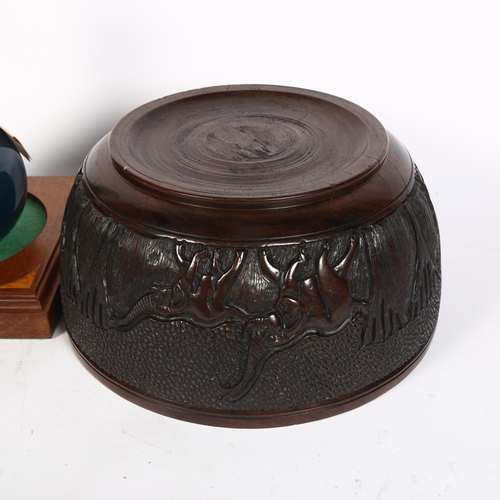 757 - Old Parr Scotch Whisky, with a carved hardwood bowl with design of elephants, 28cm diameter