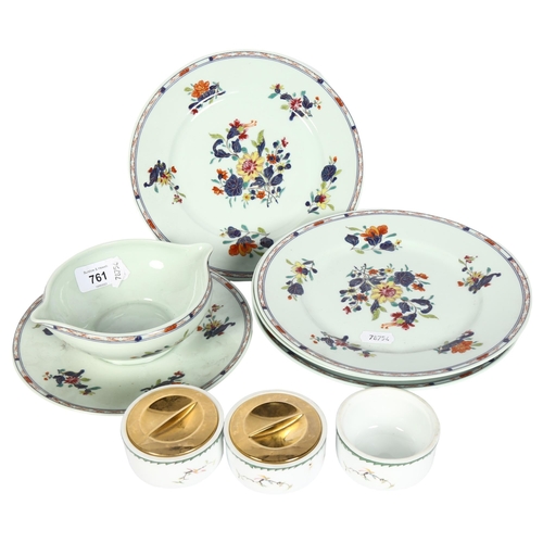 761 - 4 Limoges porcelain plates, with floral decoration, matching sauce boat, and 3 Clair De Parfum pots