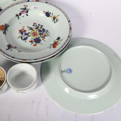 761 - 4 Limoges porcelain plates, with floral decoration, matching sauce boat, and 3 Clair De Parfum pots