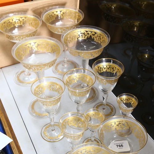 766 - A set of 4 Antique Venetian Champagne glasses, with enamelled and gilded decoration, matching goblet... 