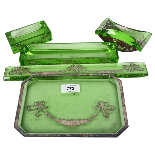 772 - An Art Deco silver overlaid green glass desk set, comprising paperweight, pen tray, desk blotter, in... 