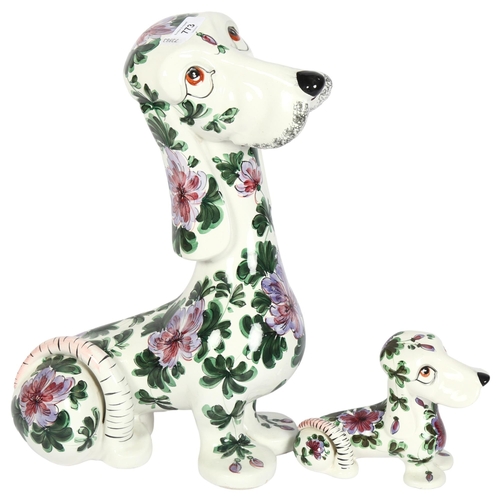 773 - A large Italian dog with painted floral decoration, 43cm, and matching small dog