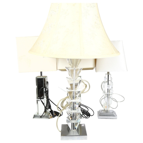 778 - A pair of table lamps with mirrored glass columns and cream shades, height 55cm overall, a table lam... 