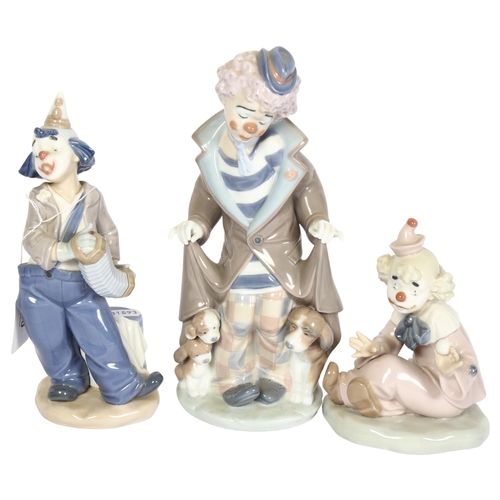 790 - Lladro porcelain clown with puppies, 24cm, and 2 smaller NAO clowns