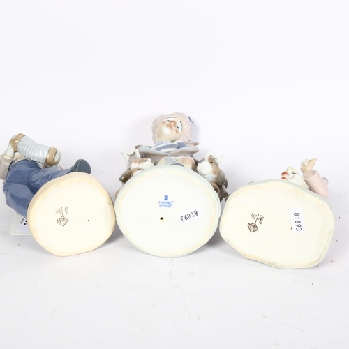 790 - Lladro porcelain clown with puppies, 24cm, and 2 smaller NAO clowns