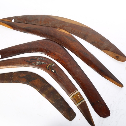 825 - A group of 5 Australian boomerangs, 3 with carved and painted decoration, longest 64cm