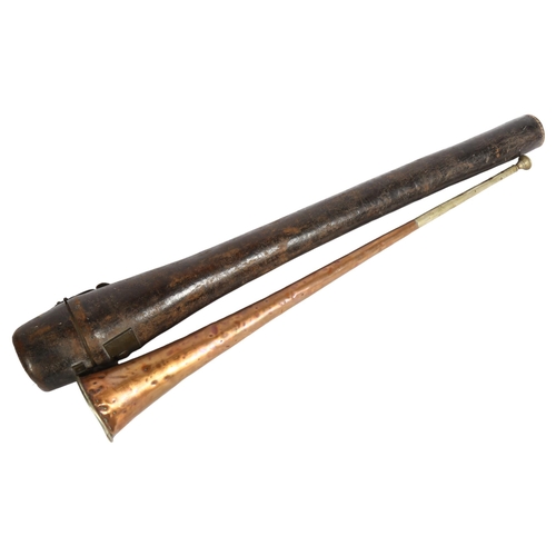 839 - Antique copper and brass horn, in fitted leather case with brass lock, length 76cm