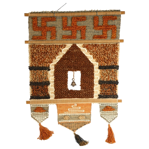 864 - Don Freedman (American) Folk Art fibre and woolwork Tibetan style wall hanging with bell, 65cm acros... 