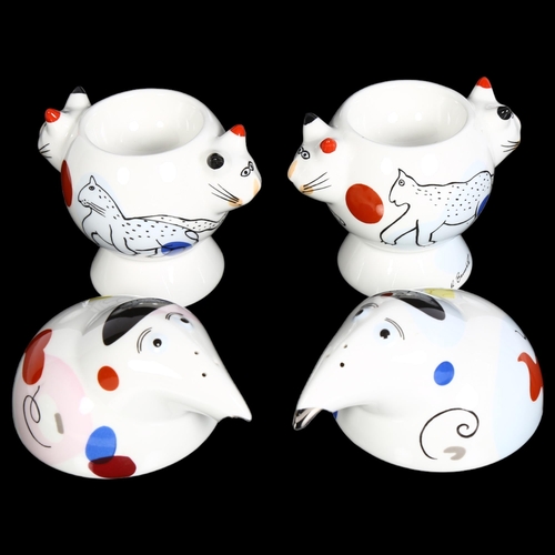 875 - ROSEMARY BENEDIKT for VILLEROY & BOCH - a pair of stylised cat design egg cups, and a pair of pepper... 