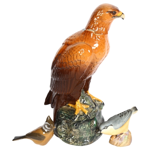 878 - A Whyte & Mackay Golden Eagle design decanter, by Royal Doulton, modelled by John G Tongue, 1984, he... 