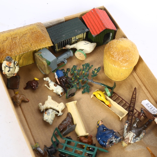 894 - A group of various painted lead farm buildings, animals and figures, including a Dinky Toys wheelbar... 