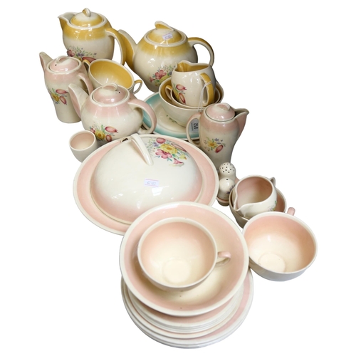 912 - A collection of Susie Cooper Dresden Spray tea and coffee ware, including teapots, food warmer etc