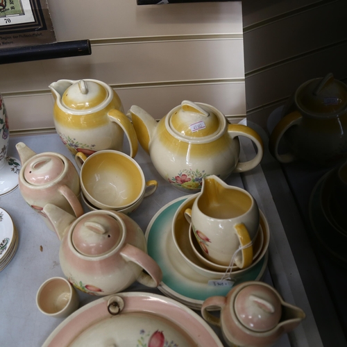 912 - A collection of Susie Cooper Dresden Spray tea and coffee ware, including teapots, food warmer etc