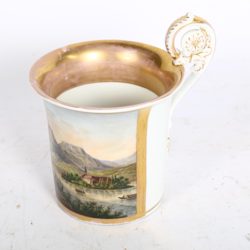 919 - A fine 19th century hand painted porcelain cabinet cup, with landscape scene depicting riverside vil... 