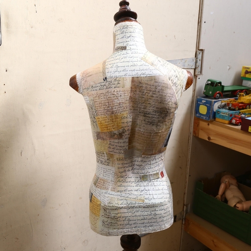 928 - Clive Fredriksson, a decoupage decorated half-size mannequin of the female form, on pine tripod stan... 