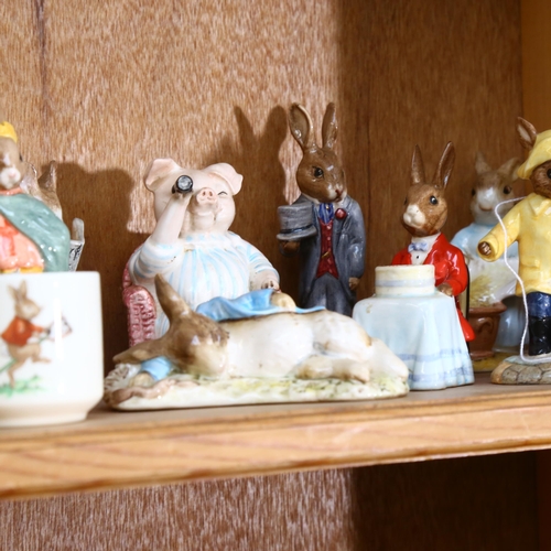 960 - A group of Royal Doulton and Royal Albert Bunnykins and Beatrix Potter figures, and 2 egg cups