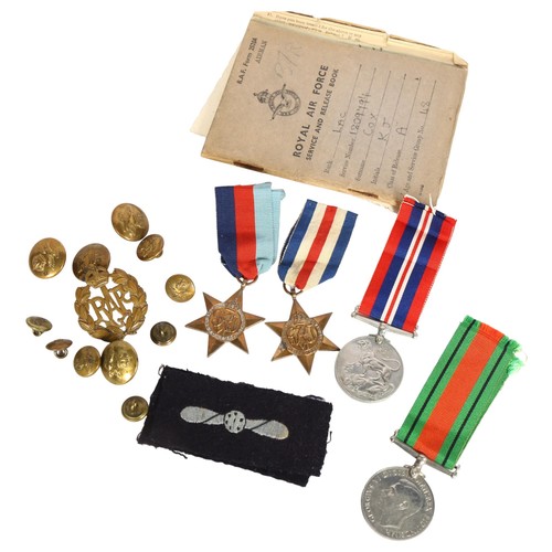 899 - A group of military buttons, Second World War medal, various postcards etc