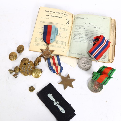 899 - A group of military buttons, Second World War medal, various postcards etc