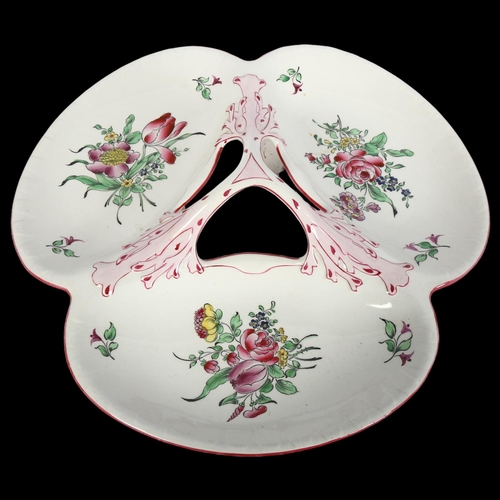 1001 - A Luneville hors d'oeuvres dish, with painted floral decoration, 34cm across