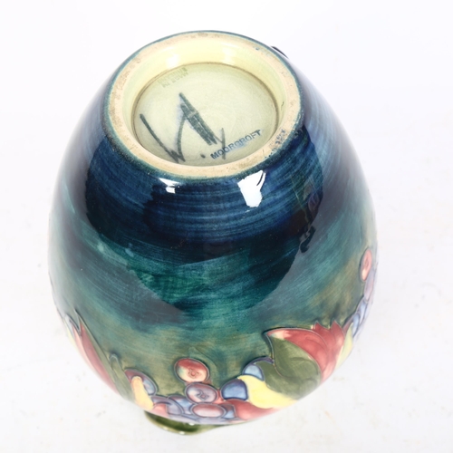 1010 - Antique Moorcroft jug with tube-lined fruit decoration, signed (A/F), height 19cm