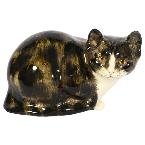 1025 - A Winstanley tabby cat with glass eyes, length 24cm