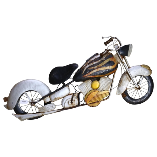 1056 - A Steam Punk wall art, a pressed metal study of a motorcycle, length 100cm