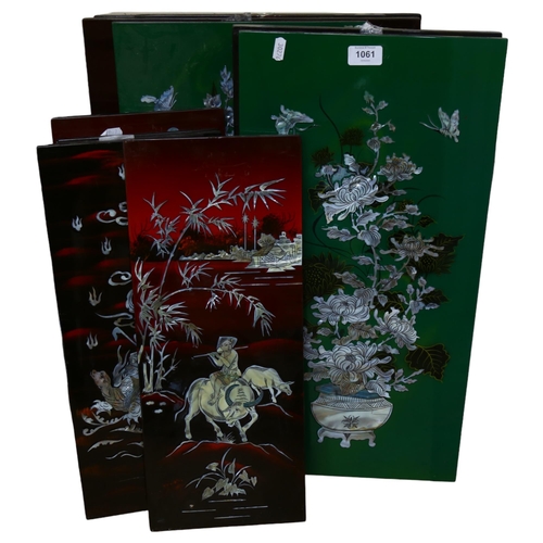 1061 - A group of Oriental design lacquered panels (11)