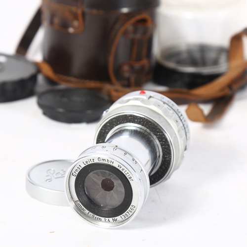 1066 - A Leica Ernst Leitz GmbH Wetzlar Elmar F=9cm 1:4 NR 1387660 camera lens, with Leica lens caps and or... 