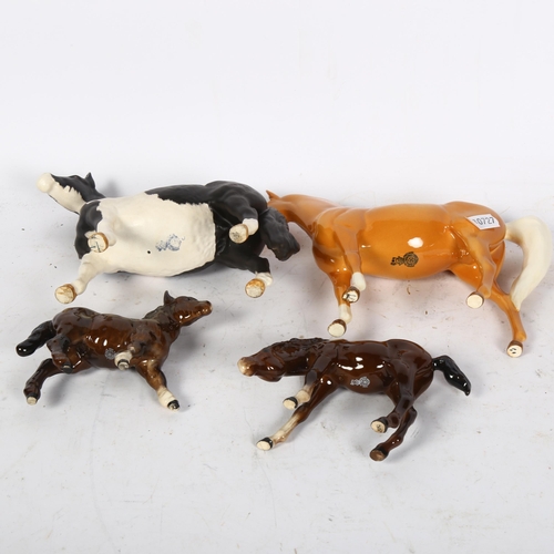 975 - A Royal Doulton palomino, Shetland foal and another, and a piebald pony