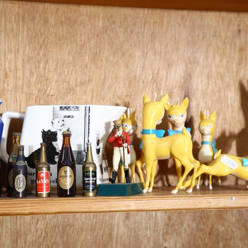 981 - A shelf of bar items, including jugs, miniatures, Babycham deer etc