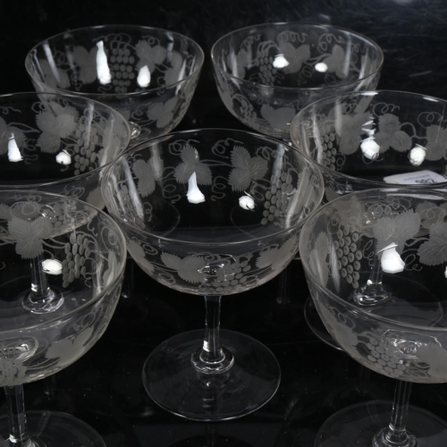 982 - A set of 7 Antique Champagne glasses, with etched grapevine design, height 10cm