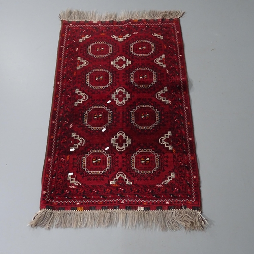 2318 - A red-ground Buchara rug. 146x90cm.