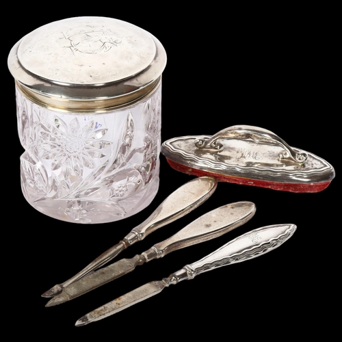 1231 - A silver-topped dressing table jar, silvered-handled manicure items and nail buffer