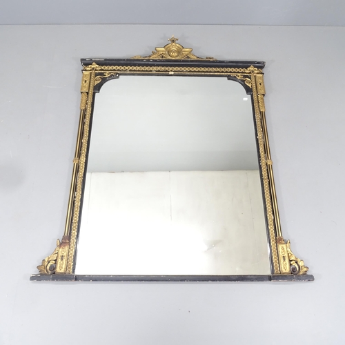 2219 - A large Victorian ebonised and gilt painted over-mantle wall mirror, with fluted pillars and applied... 