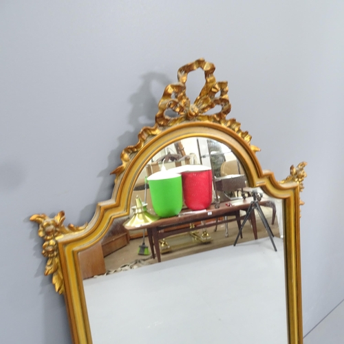 2225 - A modern French-style gilt-painted resin framed wall mirror. 59x108cm