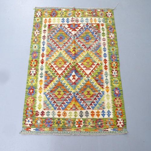 2282 - A Chobi Kilim rug. 156x100cm.