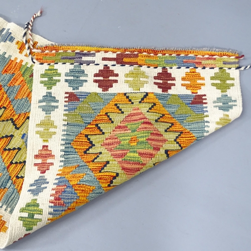 2287 - A Chobi Kilim runner. 210x64cm.