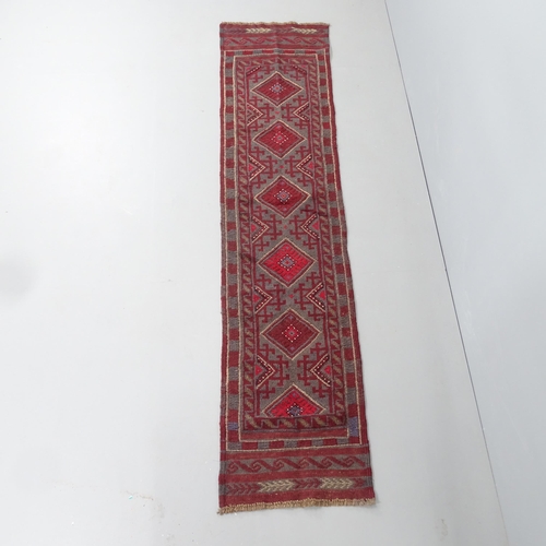 2288 - A red-ground Meshwani runner. 248x53cm