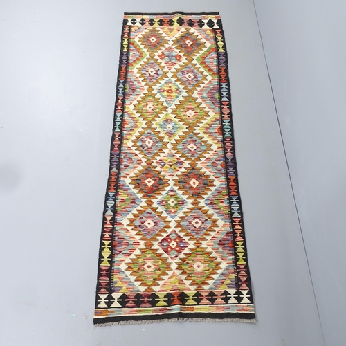 2289 - A Chobi Killim runner. 247x82cm.