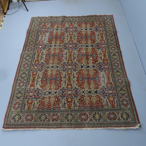 2297 - A cream-ground Kerman rug. 232x165cm