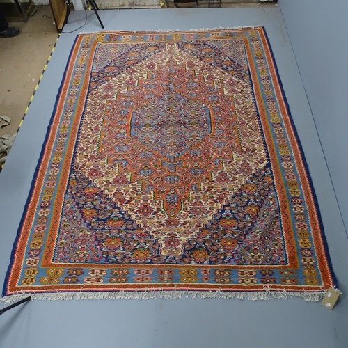 2309 - An Iranian Shiraz carpet. 270x205cm