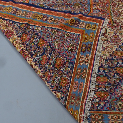 2309 - An Iranian Shiraz carpet. 270x205cm