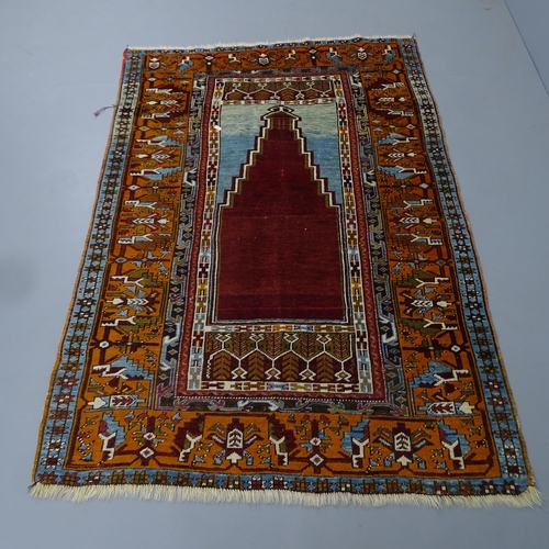 2312 - An early Turkish prayer rug, circa 1930/40s. 172x116cm